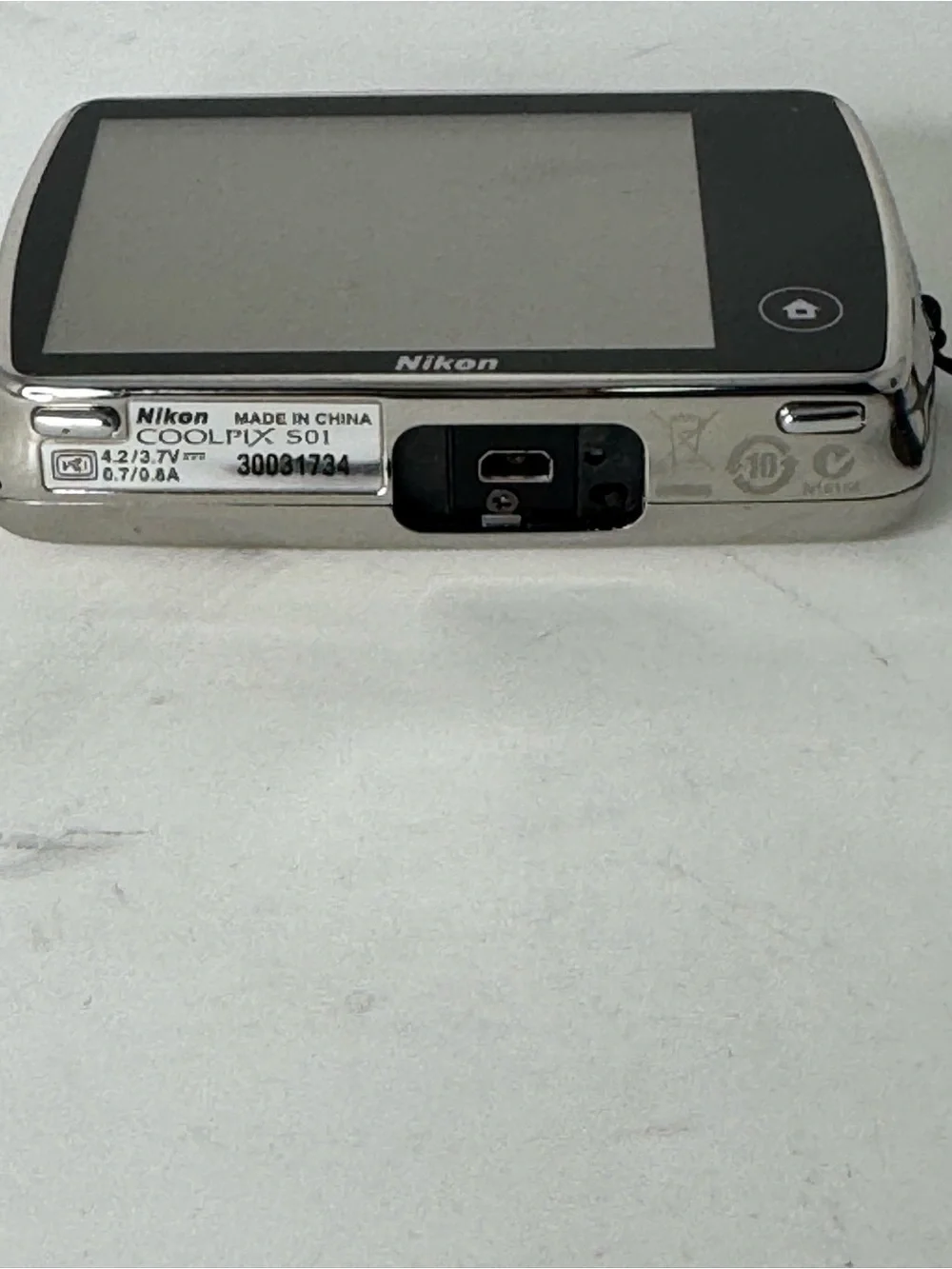 Nikon COOLPIX Silver Point-and-Shoot Camera with Black Case with charger cable